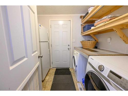 8806 85 Avenue, Grande Prairie, AB - Indoor Photo Showing Laundry Room