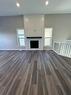 11314 107 Avenue, Grande Prairie, AB  - Indoor Photo Showing Living Room With Fireplace 