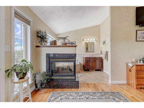 714080 Rr 73, Rural Grande Prairie No. 1, County Of, AB - Indoor Photo Showing Living Room With Fireplace