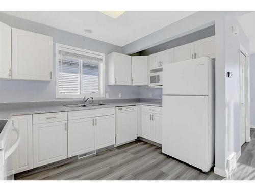 12411 97B Street, Grande Prairie, AB - Indoor Photo Showing Kitchen With Double Sink