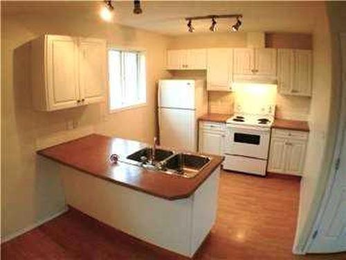 117-10150 121 Avenue, Grande Prairie, AB - Indoor Photo Showing Kitchen