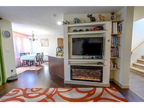 11105 60 Avenue, Grande Prairie, AB - Indoor Photo Showing Living Room With Fireplace