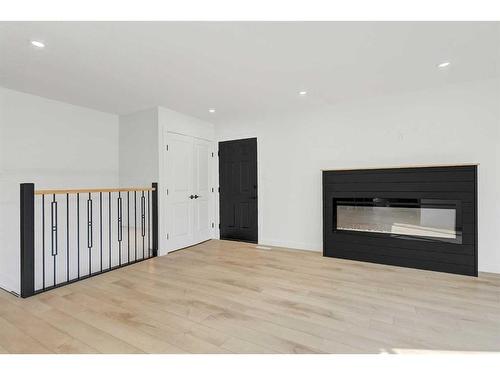 9410 80 Avenue, Grande Prairie, AB - Indoor Photo Showing Living Room With Fireplace