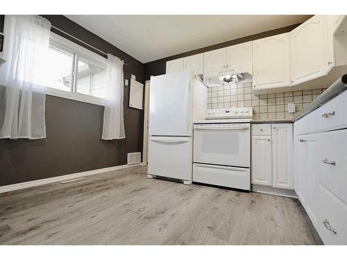 9230 100 Avenue, Grande Prairie, AB - Indoor Photo Showing Kitchen