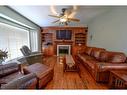 740081 Range Road 54, Rural Grande Prairie No. 1, County Of, AB  - Indoor Photo Showing Living Room With Fireplace 