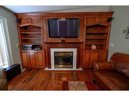 740081 Range Road 54, Rural Grande Prairie No. 1, County Of, AB - Indoor Photo Showing Living Room With Fireplace