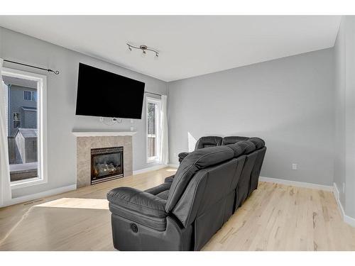 8821 88 Avenue, Grande Prairie, AB - Indoor Photo Showing Living Room With Fireplace