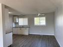 9406 102 Avenue, Grande Prairie, AB  - Indoor Photo Showing Kitchen With Double Sink 