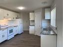 9406 102 Avenue, Grande Prairie, AB  - Indoor Photo Showing Kitchen With Double Sink 