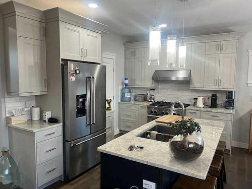 11313 106A Avenue, Grande Prairie, AB - Indoor Photo Showing Kitchen With Stainless Steel Kitchen With Double Sink With Upgraded Kitchen