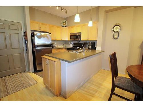 402-12330 102 Street, Grande Prairie, AB - Indoor Photo Showing Kitchen With Double Sink