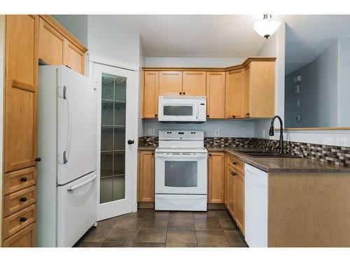 11334 Pinnacle Drive, Grande Prairie, AB - Indoor Photo Showing Kitchen