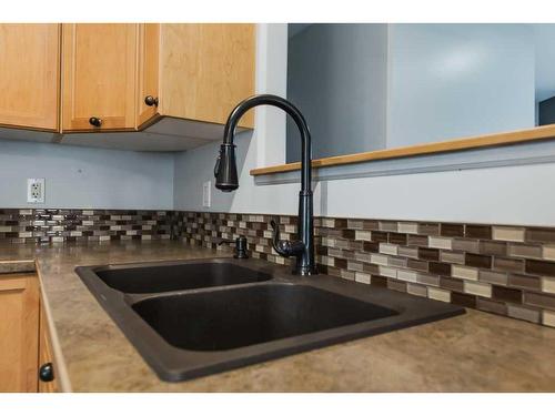 11334 Pinnacle Drive, Grande Prairie, AB - Indoor Photo Showing Kitchen With Double Sink