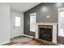 11334 Pinnacle Drive, Grande Prairie, AB  - Indoor Photo Showing Living Room With Fireplace 