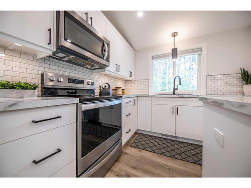 704015 Range Road 64, Rural Grande Prairie No. 1, County Of, AB - Indoor Photo Showing Kitchen With Upgraded Kitchen