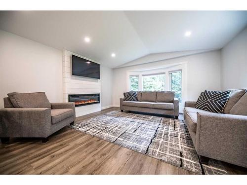 704015 Range Road 64, Rural Grande Prairie No. 1, County Of, AB - Indoor Photo Showing Living Room With Fireplace