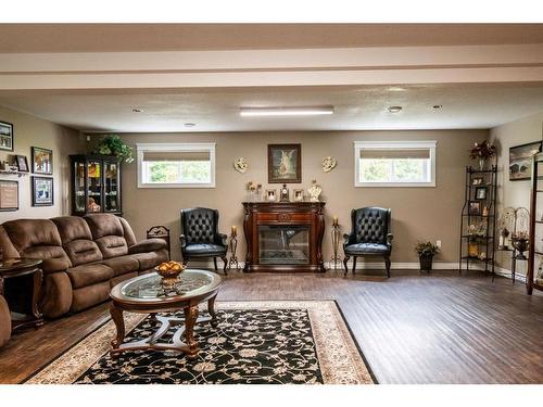 723034 Range Rd 62, Clairmont, AB - Indoor Photo Showing Living Room With Fireplace