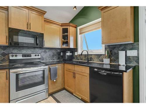 8902 130 A Avenue, Grande Prairie, AB - Indoor Photo Showing Kitchen With Double Sink