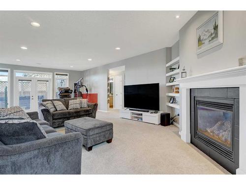 8902 130 A Avenue, Grande Prairie, AB - Indoor Photo Showing Living Room With Fireplace