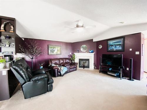 8366 794 Township, Rural Saddle Hills County, AB - Indoor Photo Showing Living Room With Fireplace