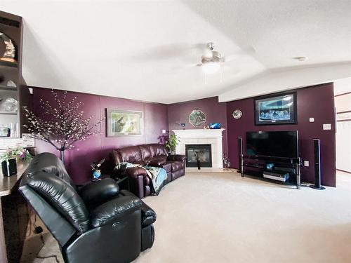 8366 794 Township, Rural Saddle Hills County, AB - Indoor Photo Showing Living Room With Fireplace