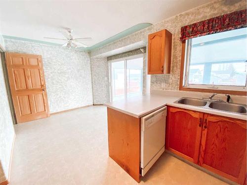 4535 46 Street, Rycroft, AB - Indoor Photo Showing Kitchen With Double Sink