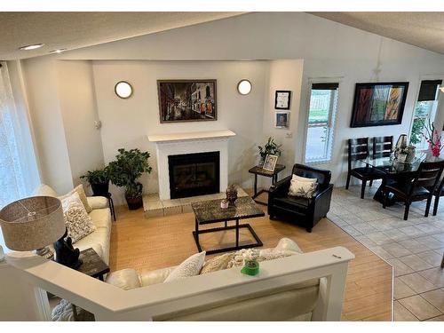 11401 69 Avenue, Grande Prairie, AB - Indoor Photo Showing Living Room With Fireplace