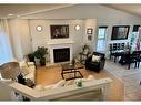 11401 69 Avenue, Grande Prairie, AB  - Indoor Photo Showing Living Room With Fireplace 