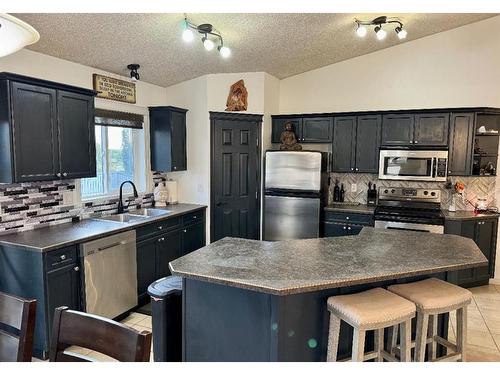 11401 69 Avenue, Grande Prairie, AB - Indoor Photo Showing Kitchen With Double Sink