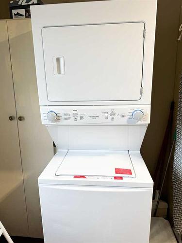 5008 49 Avenue, Guy, AB - Indoor Photo Showing Laundry Room