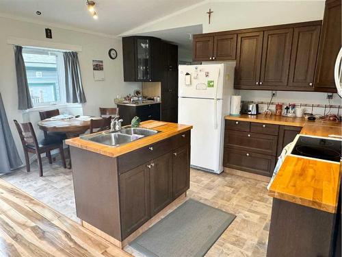 5008 49 Avenue, Guy, AB - Indoor Photo Showing Kitchen With Double Sink