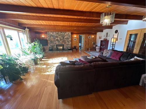 11905 91 Street, Peace River, AB - Indoor Photo Showing Living Room With Fireplace