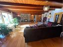 11905 91 Street, Peace River, AB  - Indoor Photo Showing Living Room With Fireplace 