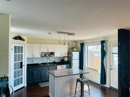 10315 91 Street, Grande Prairie, AB - Indoor Photo Showing Kitchen With Double Sink