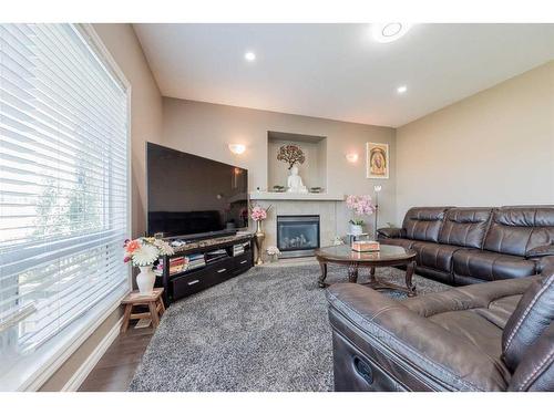 10506 129 Avenue, Grande Prairie, AB - Indoor Photo Showing Living Room With Fireplace