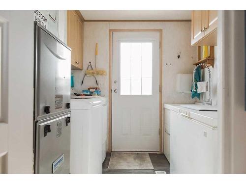 91048/91054 Township Road 704, Wembley, AB - Indoor Photo Showing Laundry Room