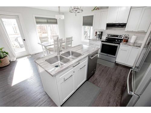 10213 125 Avenue, Grande Prairie, AB - Indoor Photo Showing Kitchen With Double Sink