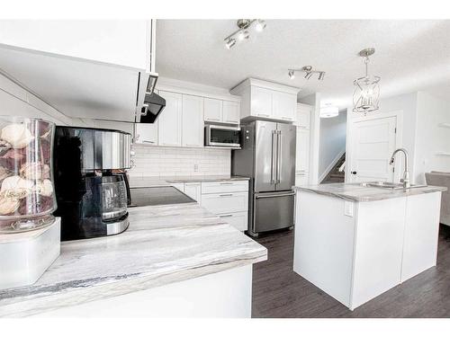 10213 125 Avenue, Grande Prairie, AB - Indoor Photo Showing Kitchen With Stainless Steel Kitchen With Double Sink With Upgraded Kitchen