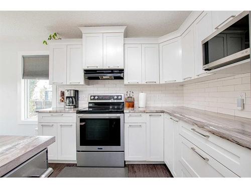 10213 125 Avenue, Grande Prairie, AB - Indoor Photo Showing Kitchen With Upgraded Kitchen