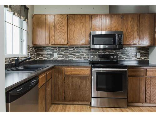 10210 91 Street, Grande Prairie, AB - Indoor Photo Showing Kitchen With Double Sink