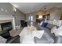 11338 59 Avenue, Grande Prairie, AB  - Indoor Photo Showing Living Room With Fireplace 