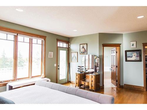 723047 A, B, C Range Road 54, Clairmont, AB - Indoor Photo Showing Bedroom