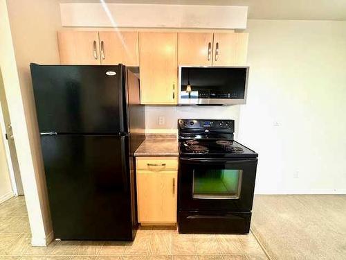 404-9120 96 Avenue, Grande Prairie, AB - Indoor Photo Showing Kitchen