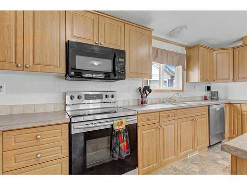 8818 89 Avenue, Grande Prairie, AB - Indoor Photo Showing Kitchen