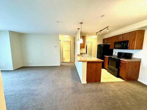 111-9120 96 Avenue, Grande Prairie, AB - Indoor Photo Showing Kitchen