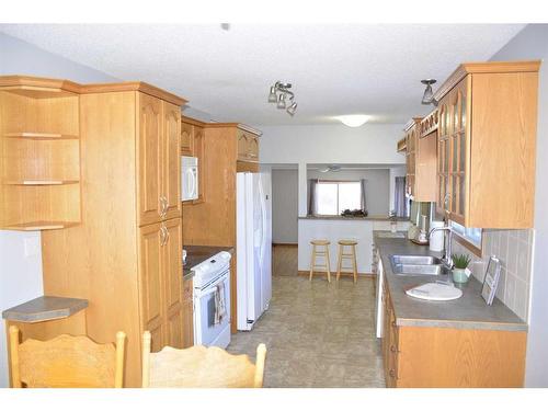 4429 54 Street, Grimshaw, AB - Indoor Photo Showing Kitchen With Double Sink