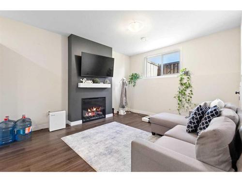 11910 79 Avenue, Grande Prairie, AB - Indoor Photo Showing Living Room With Fireplace