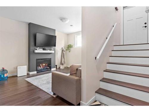 11910 79 Avenue, Grande Prairie, AB - Indoor Photo Showing Living Room With Fireplace