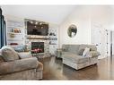 11910 79 Avenue, Grande Prairie, AB  - Indoor Photo Showing Living Room With Fireplace 