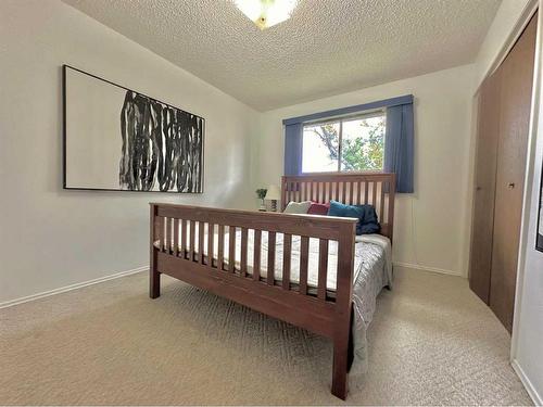 9901 71A Avenue, Grande Prairie, AB - Indoor Photo Showing Bedroom